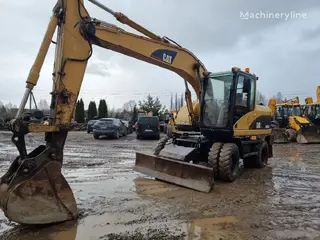 Cat M313C — Ratiniai ekskavatoriai — naudotas parduodama | 123Machinery