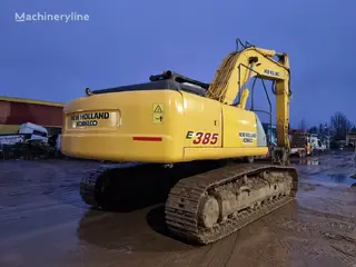 New Holland 349 Kobelco E385 — Foto 8
