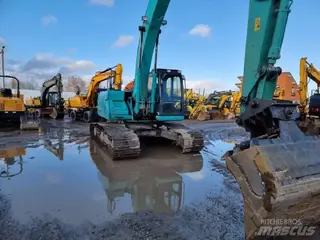 Kobelco 349 SK210LC-9 — Ilgos strėlės ekskavatoriai — naudotas parduodama | 123Machinery