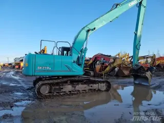Kobelco 349 SK210LC-9 — Foto 3