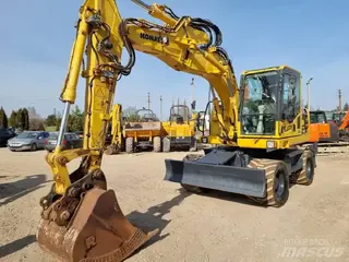 Komatsu 315 PW148-8 — Foto 7
