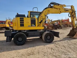 Komatsu 315 PW148-8 — Foto 8