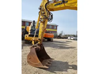 Komatsu 315 PW148-8 — Foto 9
