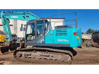 Kobelco 315 SK210LC — Foto 7