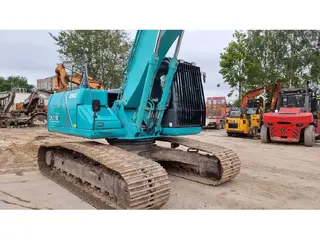 Kobelco 315 SK210LC — Foto 10