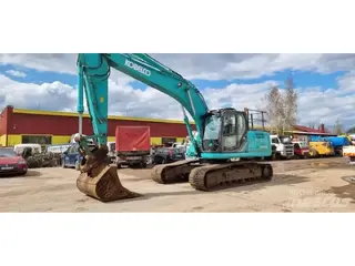 Kobelco 1304 SK210LC-9 — Foto 3