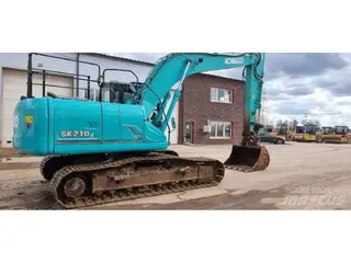 Kobelco 1304 SK210LC-9 — Foto 7